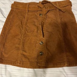 AMERICAN EAGLE brown shirt.